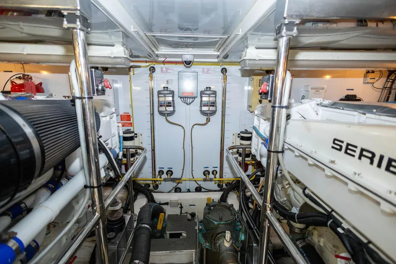 Slide: The Image of Engine room of 2005 Ocean Alexander Raised Pilothouse Flybridge Sedan, showcasing mechanical components. - 42