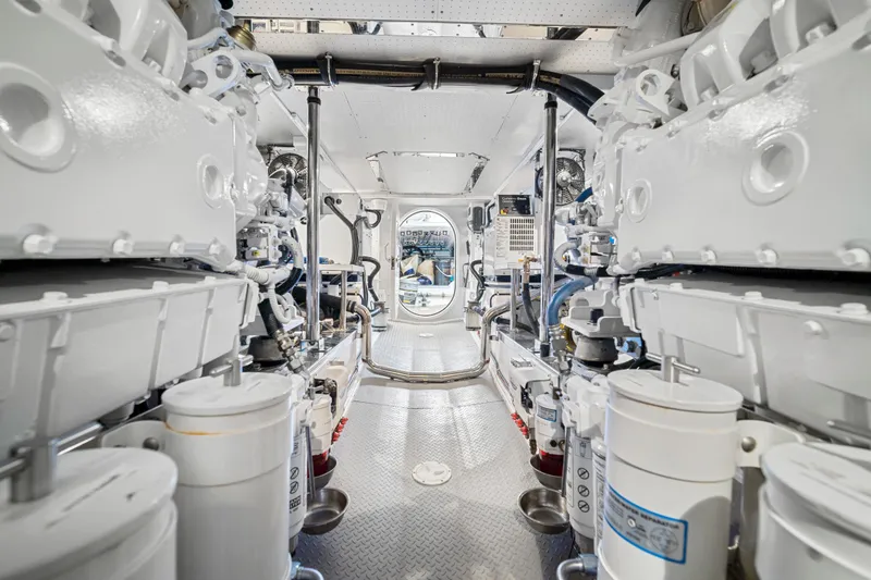 Slide: The Image of Engine room of a 2017 Fleming 65 yacht, showcasing machinery and equipment. - 42