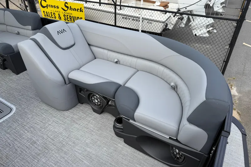 Slide: The Image of 2026 Avalon LSZ Rear Fish boat with luxurious gray seating and integrated speakers. - 12