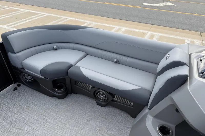 Slide: The Image of 2026 Avalon LSZ Rear Fish boat interior with gray seating and cup holders. - 14