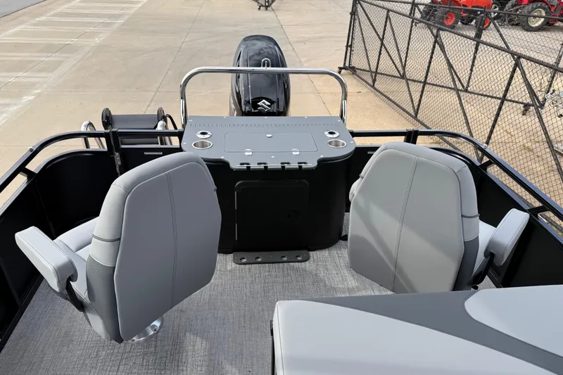 Slide: The Image of 2026 Avalon LSZ Rear Fish boat interior with two gray seats and control panel. - 20