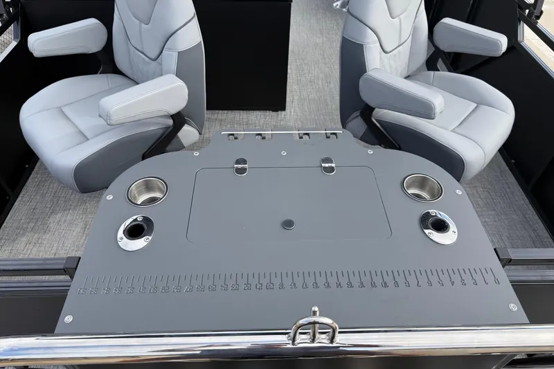 Slide: The Image of 2026 Avalon LSZ Rear Fish boat interior with two gray seats and fishing station. - 28