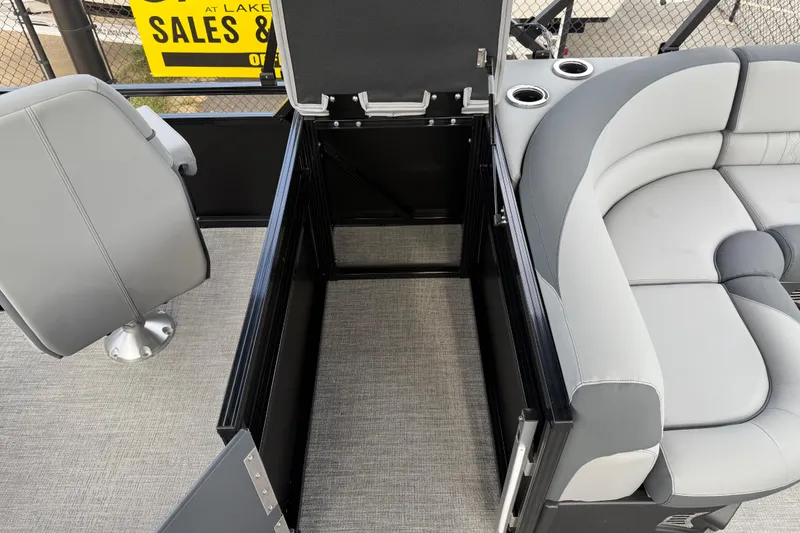 Slide: The Image of 2026 Avalon LSZ Rear Fish boat interior with open storage compartment and seating. - 30