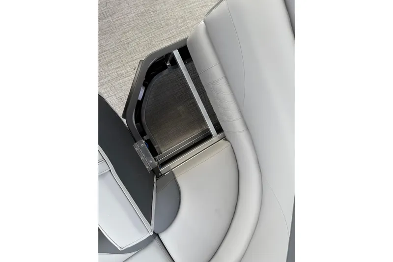 Slide: The Image of 2026 Avalon LSZ Rear Fish boat seat with storage compartment, featuring sleek gray upholstery. - 31
