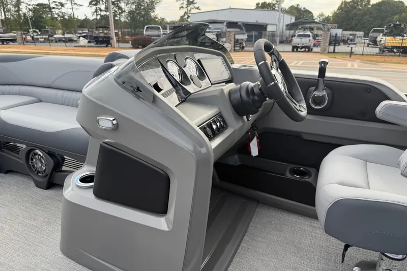 Slide: The Image of 2026 Avalon LSZ Rear Fish boat interior with modern steering console and seating. - 34