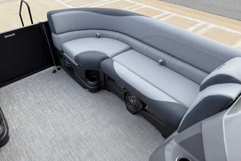 Slide: The Image of 2026 Avalon LSZ Rear Fish boat interior with gray seating and carpeted floor. - 35