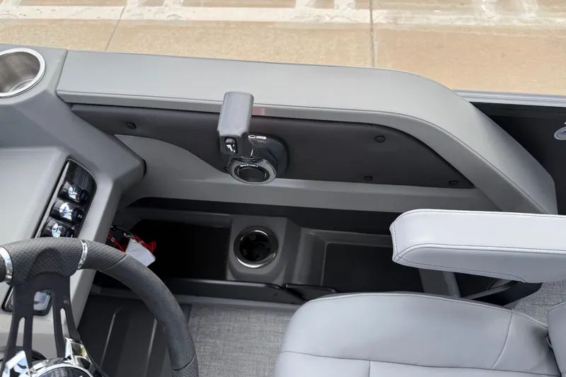 Slide: The Image of 2026 Avalon LSZ Rear Fish boat interior with steering wheel and control panel. - 45