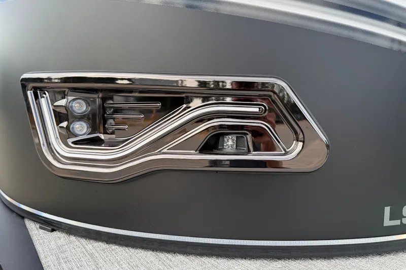 Slide: The Image of 2026 Avalon LSZ Rear Fish boat detail with sleek chrome and LED lights. - 8