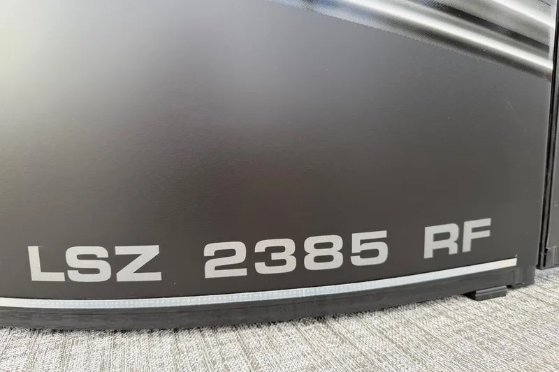 Slide: The Image of 2026 Avalon LSZ Rear Fish boat, model LSZ 2385 RF, close-up view. - 9