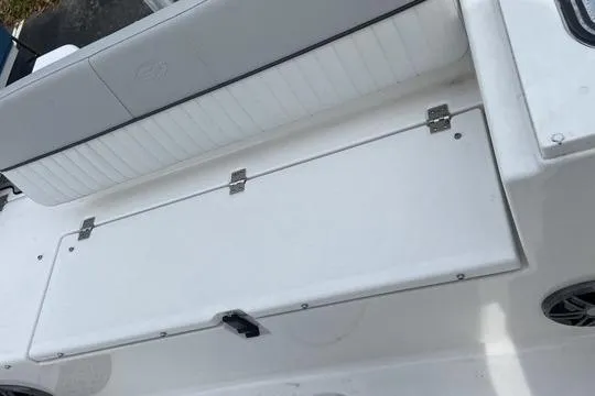 Slide: The Image of 2022 Sea Fox 228 Commander boat seating and storage compartment. - 13