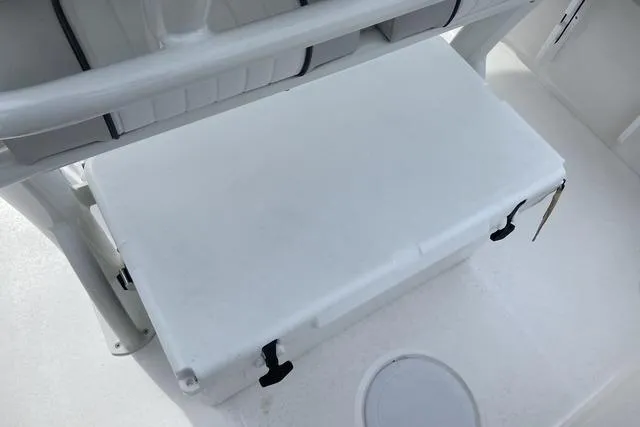 Slide: The Image of 2022 Sea Fox 228 Commander boat interior with storage compartment and seating area. - 14