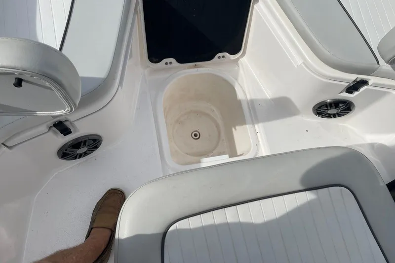 Slide: The Image of Interior of 2022 Sea Fox 228 Commander boat, featuring seating and storage area. - 19