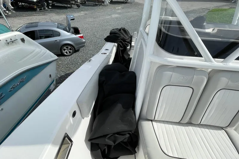 Slide: The Image of 2022 Sea Fox 228 Commander boat interior with seating and storage area. - 23