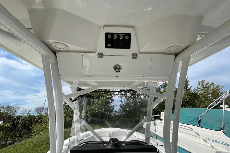 Slide: The Image of 2022 Sea Fox 228 Commander boat interior with control panel and canopy structure. - 28