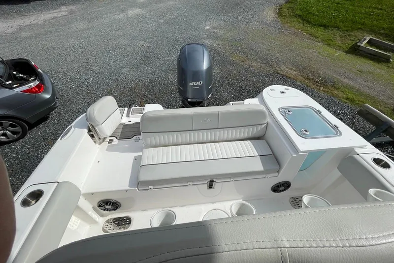 Slide: The Image of 2022 Sea Fox 228 Commander boat interior with seating and outboard motor. - 38