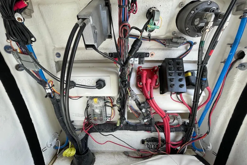 Slide: The Image of Electrical wiring and components inside a 2022 Sea Fox 228 Commander boat. - 41