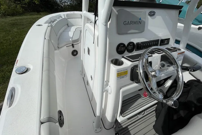 Slide: The Image of 2022 Sea Fox 228 Commander boat interior with Garmin navigation system and steering wheel. - 42