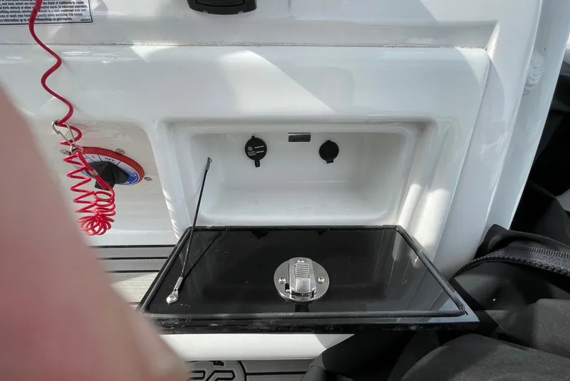 Slide: The Image of 2022 Sea Fox 228 Commander boat dashboard with control panel and safety features. - 43