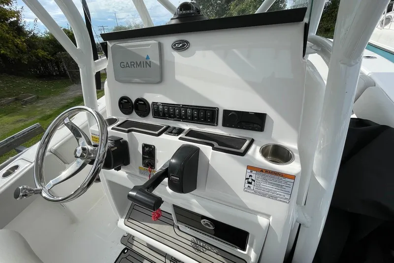 Slide: The Image of 2022 Sea Fox 228 Commander boat console with Garmin navigation system and steering wheel. - 47