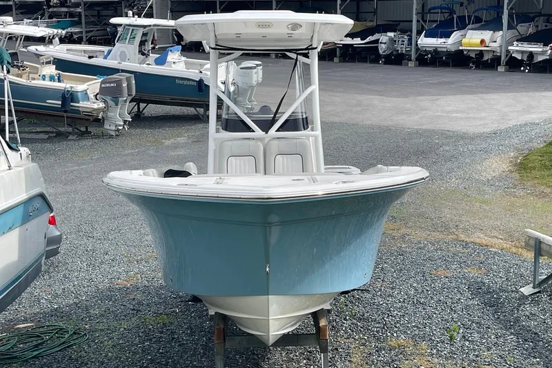 Slide: The Image of 2022 Sea Fox 228 Commander boat in storage, front view, blue hull. - 5