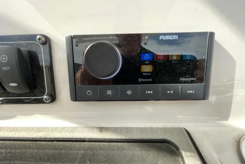 Slide: The Image of Fusion audio system on 2022 Sea Fox 228 Commander boat dashboard. - 51