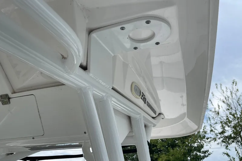 Slide: The Image of 2022 Sea Fox 228 Commander boat detail with white structure and overcast sky. - 71