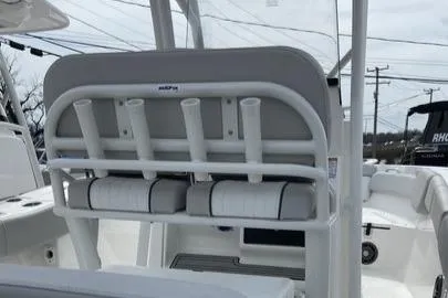 Slide: The Image of 2022 Sea Fox 228 Commander boat interior with rod holders and seating. - 8