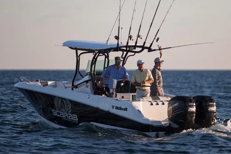Slide: The Image of Manufacturer Provided Image: 2017 Wellcraft 262 Scarab Offshore boat with anglers fishing on open water. - 7