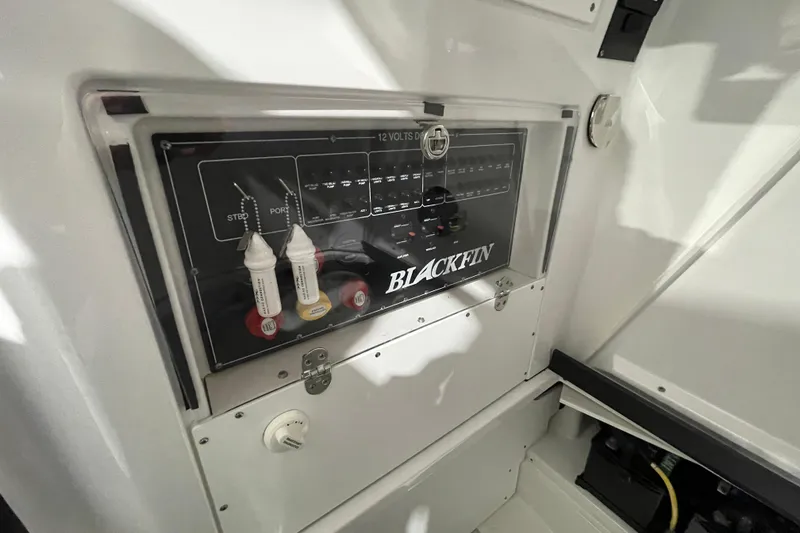 Slide: The Image of Control panel of 2019 Blackfin 272 CC boat, featuring switches and labels. - 26