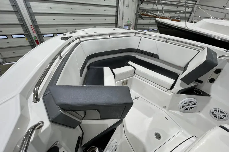 Slide: The Image of 2019 Blackfin 272 CC boat interior with white seating and stainless steel railings. - 27