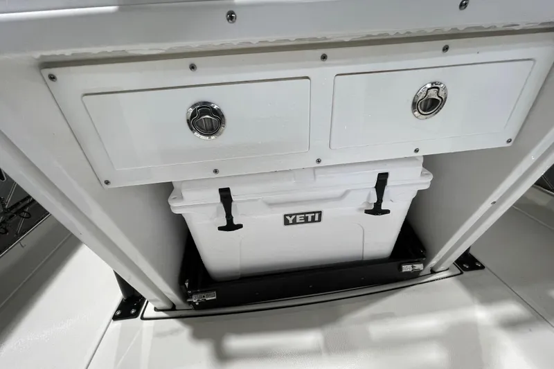 Slide: The Image of 2019 Blackfin 272 CC boat storage with Yeti cooler and dual compartments. - 37