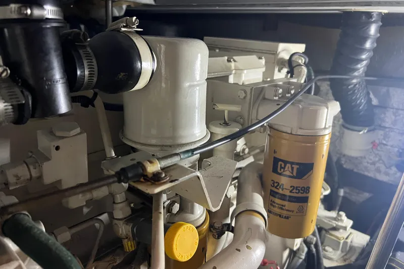 Slide: The Image of Engine compartment of a 1997 Silverton 402 Motor Yacht with CAT filter. - 33