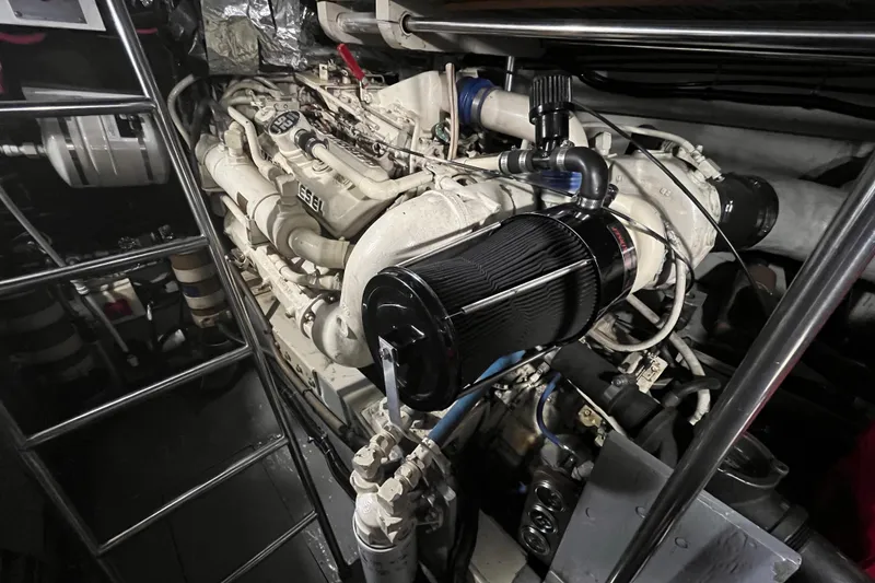 Slide: The Image of Engine room of a 1992 Tiara Yachts 4300 Open, showcasing detailed machinery. - 16