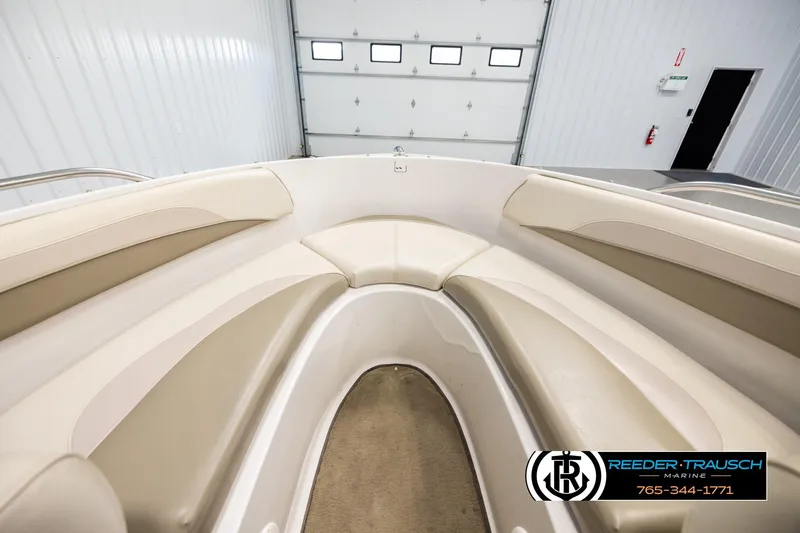 Slide: The Image of Interior view of 1999 Four Winns 180 Horizon boat with beige seating. - 15