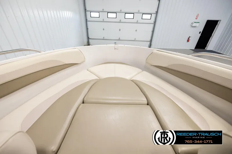 Slide: The Image of Interior view of 1999 Four Winns 180 Horizon boat with beige seating. - 16