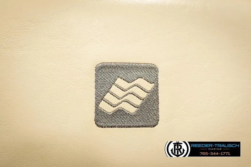 Slide: The Image of Embroidered logo on beige leather, 1999 Four Winns 180 Horizon boat interior. - 29