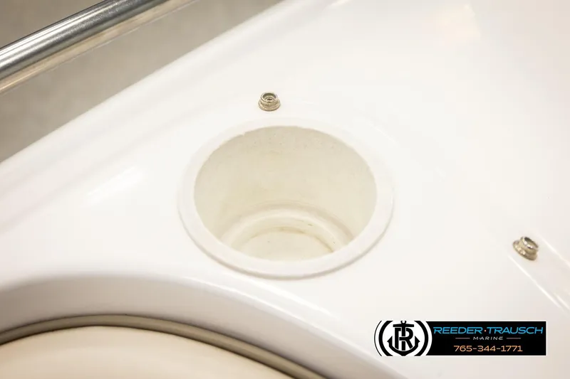 Slide: The Image of Cup holder on 1999 Four Winns 180 Horizon boat, featuring Reeder-Trausch Marine logo. - 33