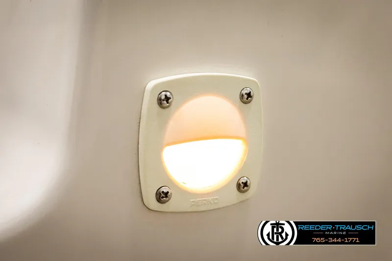 Slide: The Image of 1999 Four Winns 180 Horizon boat interior light fixture, close-up view. - 34