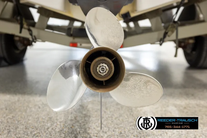 Slide: The Image of Close-up of a 1999 Four Winns 180 Horizon boat propeller on a trailer. - 38
