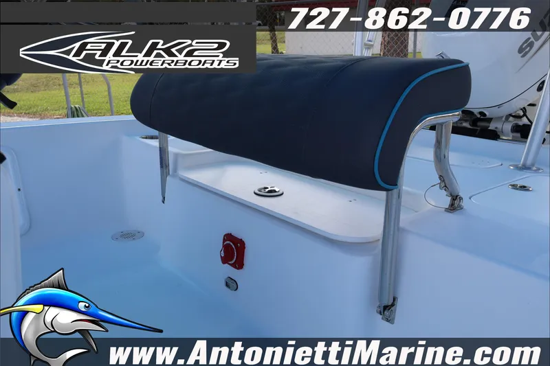 Slide: The Image of 2026 ALK2 Powerboats 17HS interior with seating, featuring marine branding and contact details. - 11