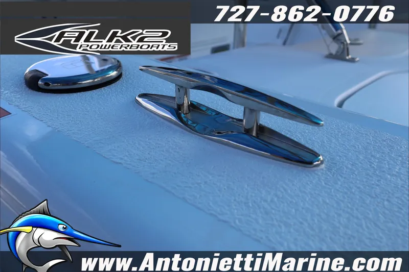 Slide: The Image of 2026 ALK2 Powerboats 17HS deck with cleat, logo, and contact details. - 13
