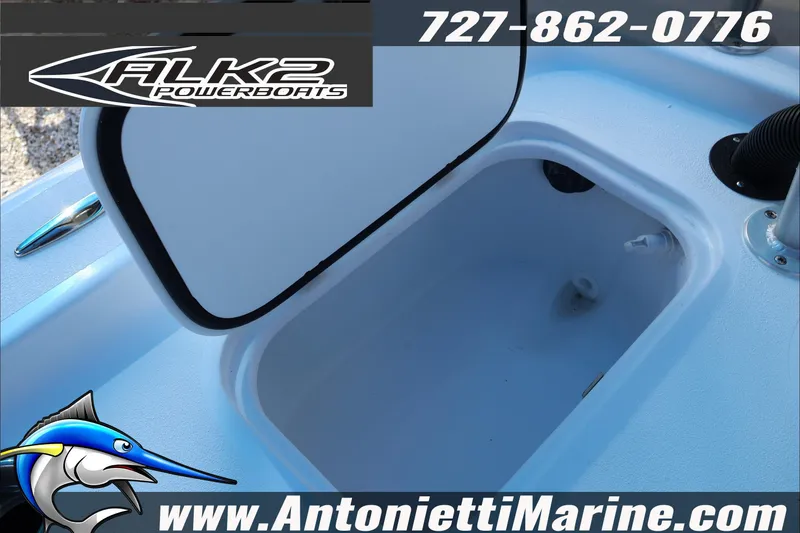 Slide: The Image of Open storage compartment on 2026 ALK2 Powerboats 17HS, featuring logo and contact details. - 24