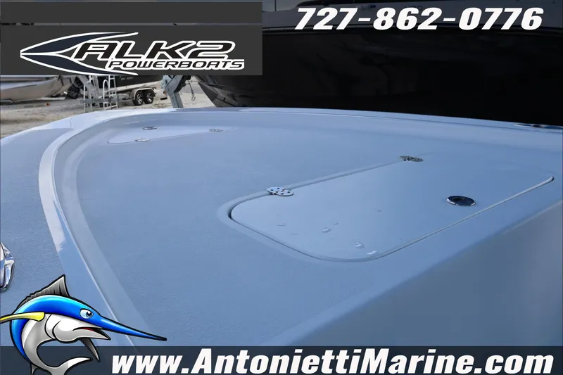 Slide: The Image of 2026 ALK2 Powerboats 17HS deck view with logo and contact details. - 7
