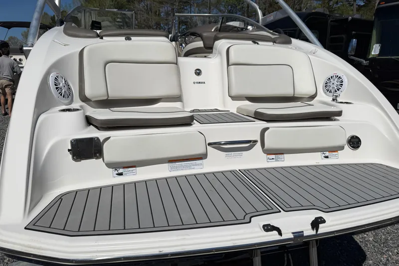 Slide: The Image of 2014 Yamaha Boats 242 Limited S, rear view with seating and speakers. - 25