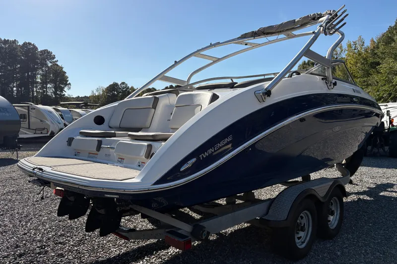 Slide: The Image of 2014 Yamaha Boats 242 Limited S on trailer, rear view, outdoors. - 4