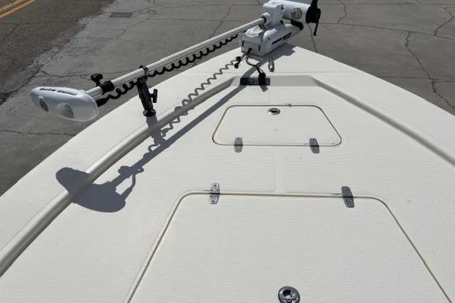 Slide: The Image of 2014 BlackJack 224 Bay boat deck with mounted trolling motor. - 10