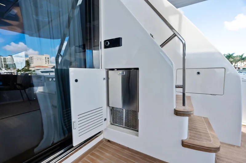 Slide: The Image of Staircase and mini-fridge on 2018 Ferretti Yachts 850 Motoryacht deck. - 37