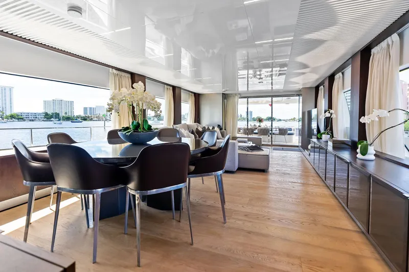 Slide: The Image of Luxurious interior of 2018 Ferretti Yachts 850 Motoryacht with elegant dining area and waterfront views. - 42