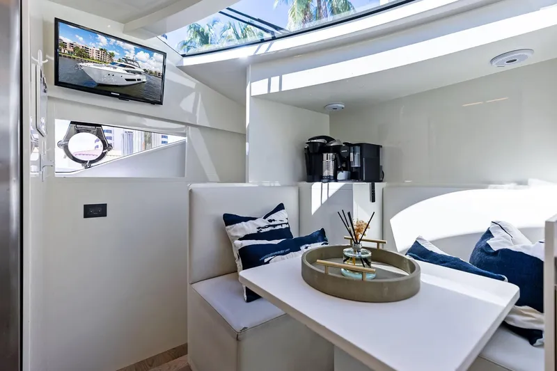 Slide: The Image of Luxurious interior of 2018 Ferretti Yachts 850 Motoryacht with modern seating and decor. - 49