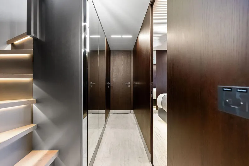 Slide: The Image of Luxurious interior of 2018 Ferretti Yachts 850 Motoryacht with modern wood paneling and sleek design. - 59